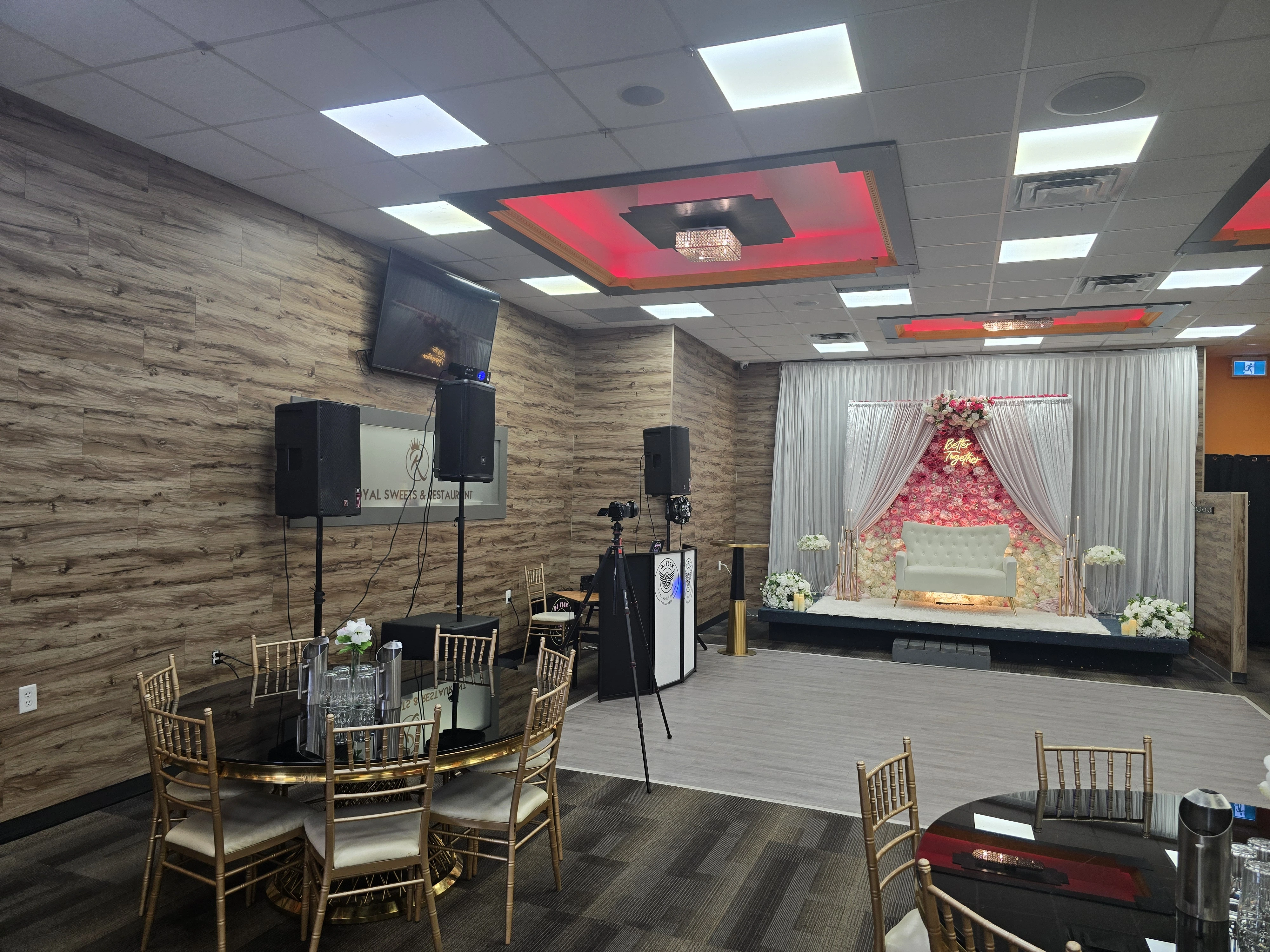 Decorated event setup inside the Royal Sweets And Restaurant banquet hall in Edmonton